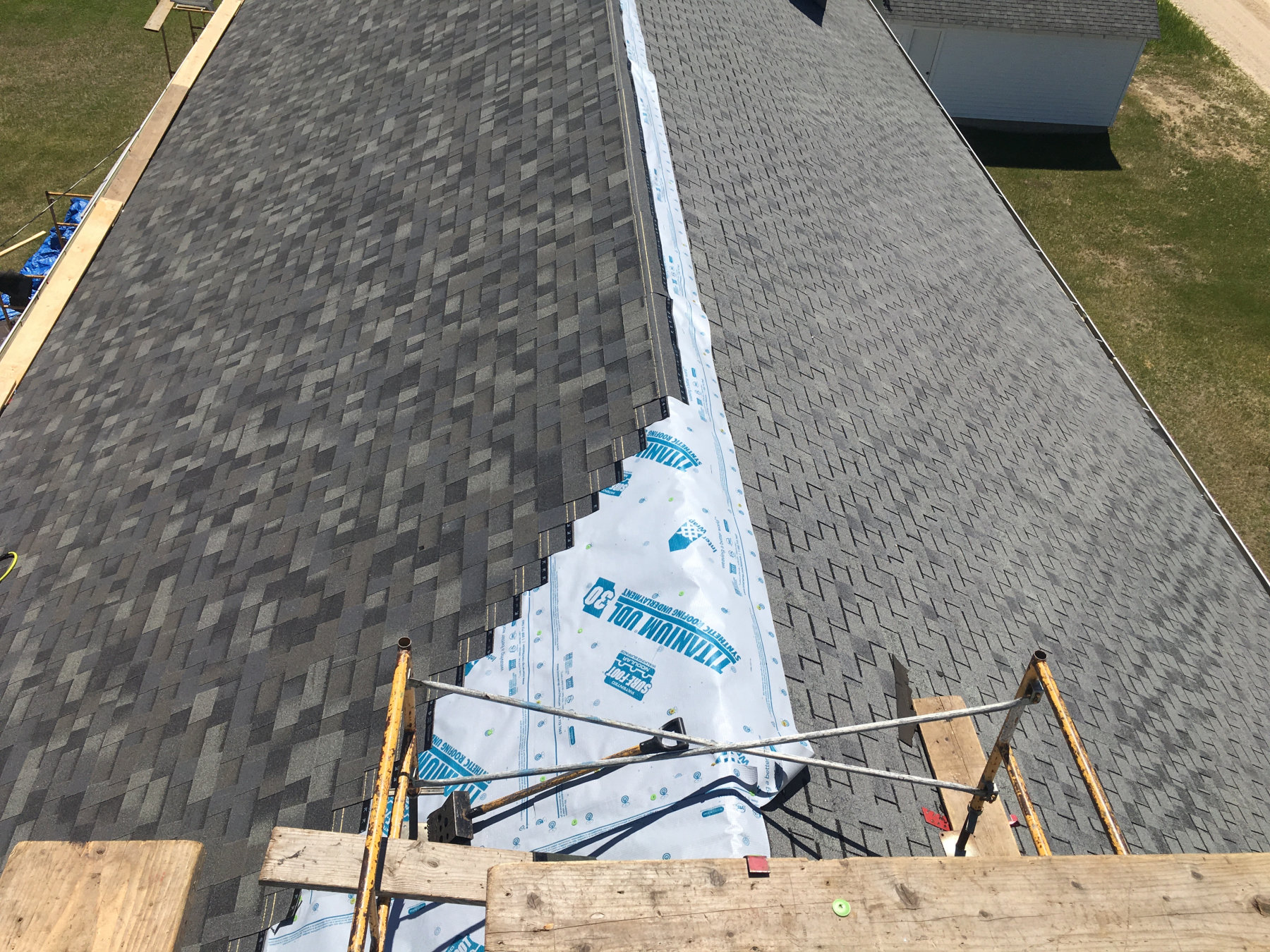 Shingle roof installation aerial